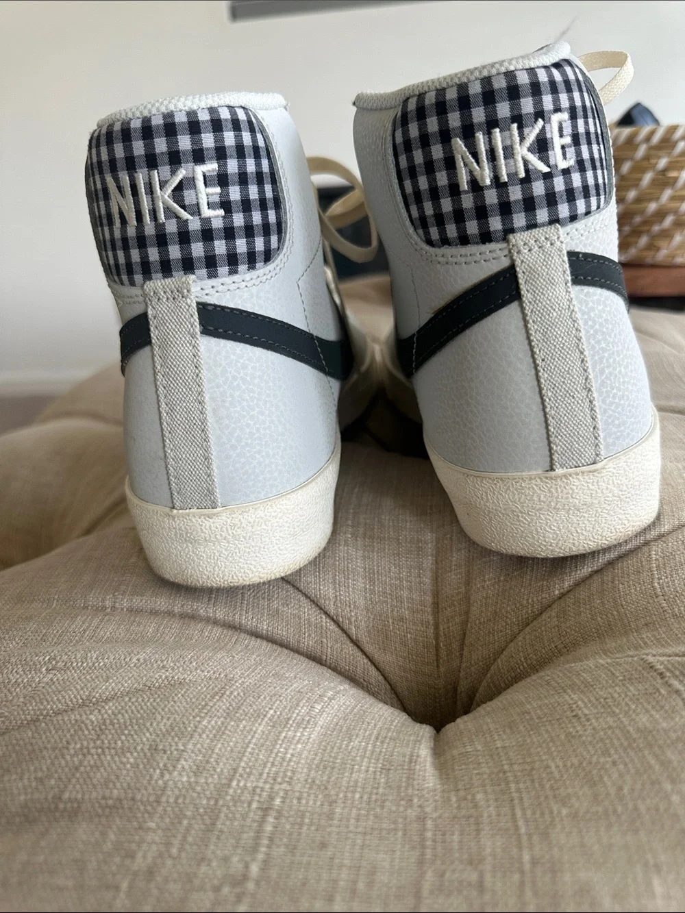 Nike High-Top Sneakers in White with Black Swoosh